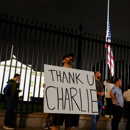 Marc Jenkins holds a placard that says "Thank u, Charlie" outside the White House after U.S. right-wing activist, commentator, Charlie Kirk, an ally of U.S. President Donald Trump, was shot dead in Utah, in Washington, D.C., U.S., September 10, 2025.