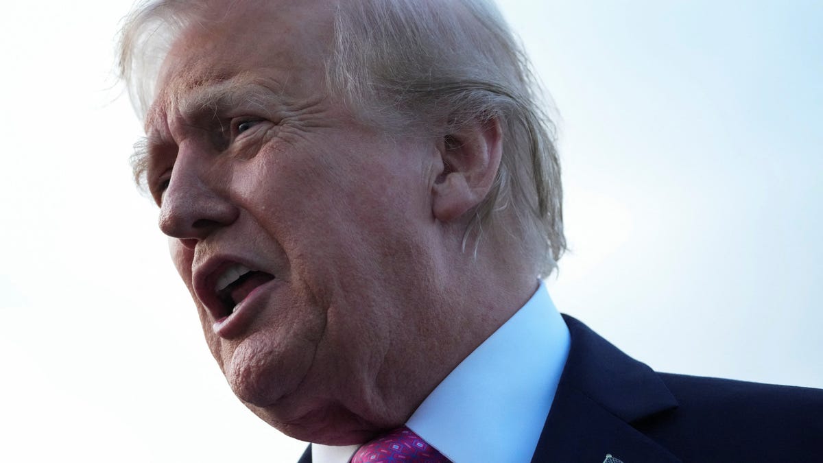 President Donald Trump speaks to the media before boarding Air Force One to depart for Washington, at Morristown Municipal Airport in Morristown, New Jersey, U.S., September 14, 2025.