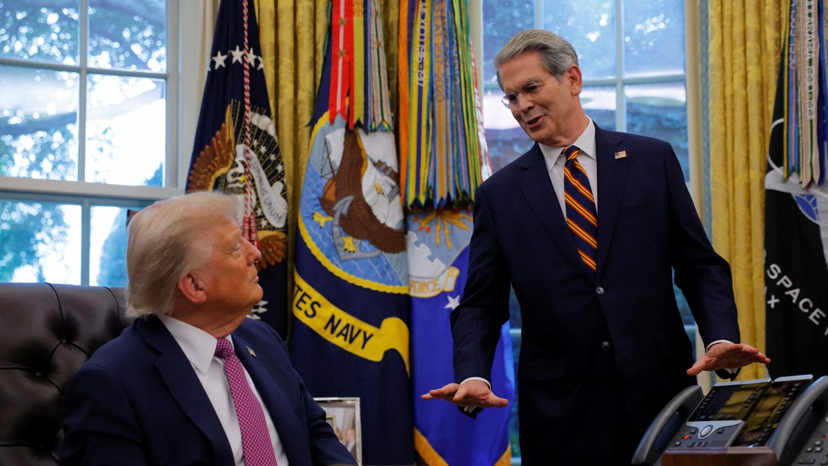 U.S. President Donald Trump speaks with U.S. Secretary of the Treasury Scott Bessent, in the Oval Office, at the White House in Washington, D.C., U.S., September 5, 2025.