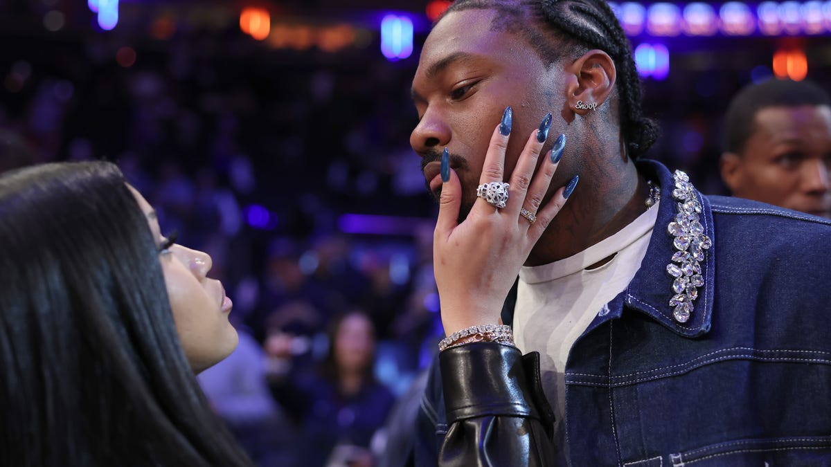 NFL Player Stefon Diggs, right, and rapper Cardi B celebrate after Game 4 of the Eastern Conference Second Round NBA Playoffs between the Boston Celtics and the New York Knicks at Madison Square Garden on May 12, 2025, in New York City.