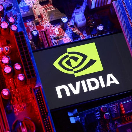 An Nvidia logo and a computer motherboard appear in this illustration taken August 25, 2025.