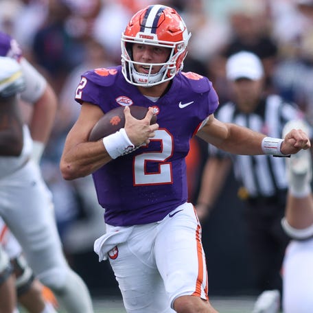 Clemson quarterback Cade Klubnik (2) runs the ball against Georgia Tech during their game at Bobby Dodd Stadium at Hyundai Field.