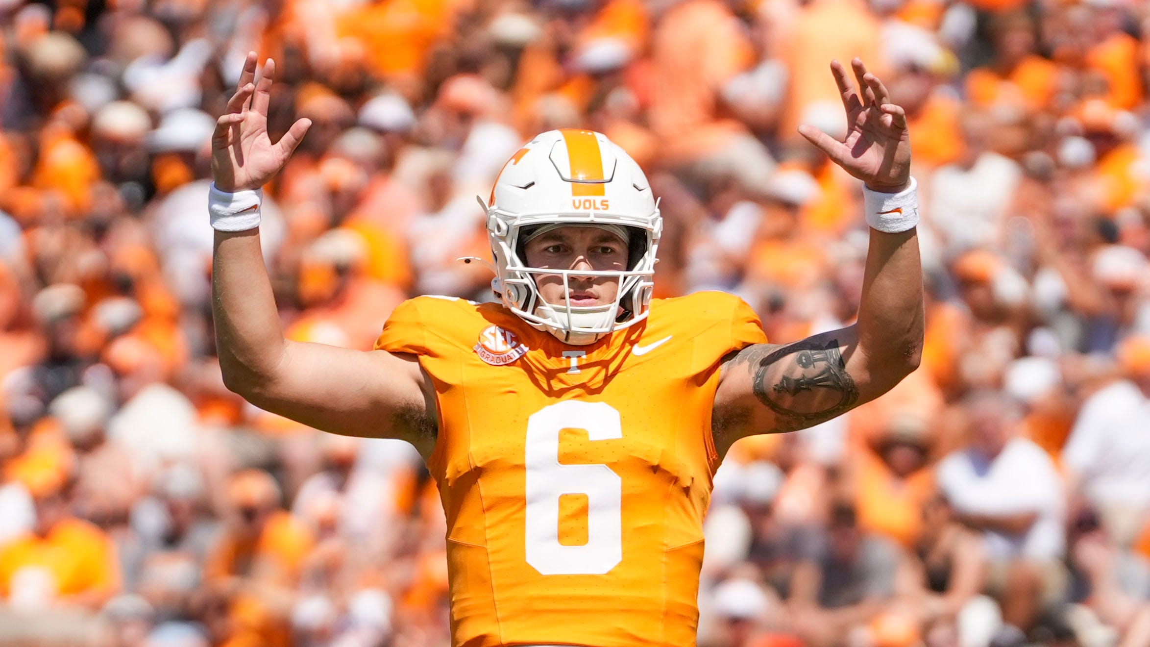 Tennessee football quarterback Joey Aguilar reacts to young
