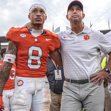 Clemson cornerback Avieon Terrell (8) stands with coach Dabo Swinney after the Tigers lost to Syracuse at Memorial Stadium.