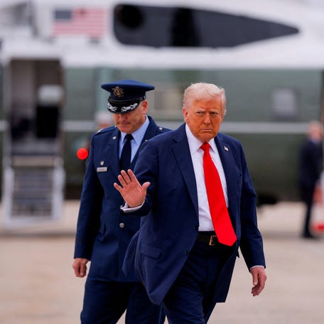U.S. President Donald Trump walks to board Air Force One to depart for a memorial service for slain conservative commentator Charlie Kirk, at Joint Base Andrews, Maryland, U.S., September 21, 2025.