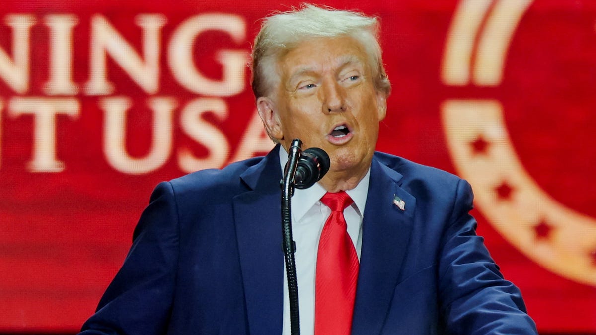 President Donald Trump speaks onstage during a memorial service for slain conservative commentator Charlie Kirk.