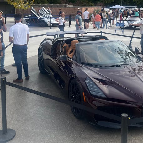 Bugatti Mistral surrounded by other hypercars at the Northwood Internation Autoshow