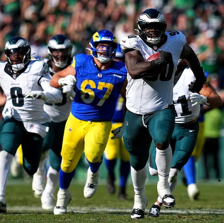 Jordan Davis of the Philadelphia Eagles returns a blocked field goal for a touchdown against the Los Angeles Rams during the fourth quarter at Lincoln Financial Field on Sept. 21, 2025.