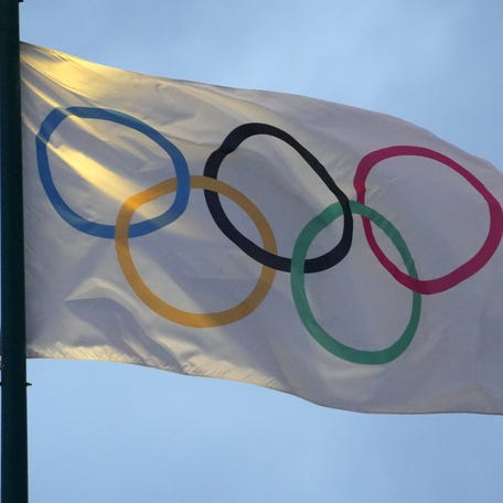 Jan 19, 2025; Atlanta, GA, USA; The Olympic rings flag at Centennial Park. Mandatory Credit: Kirby Lee-Imagn Images