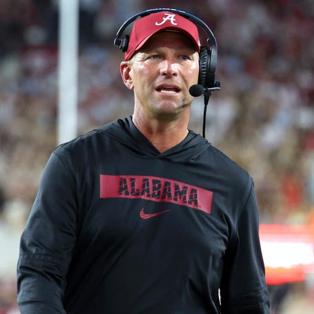 Alabama football coach Kalen DeBoer paces the sidelines during his team's game against Louisiana-Monroe at Saban Field at Bryant-Denny Stadium.