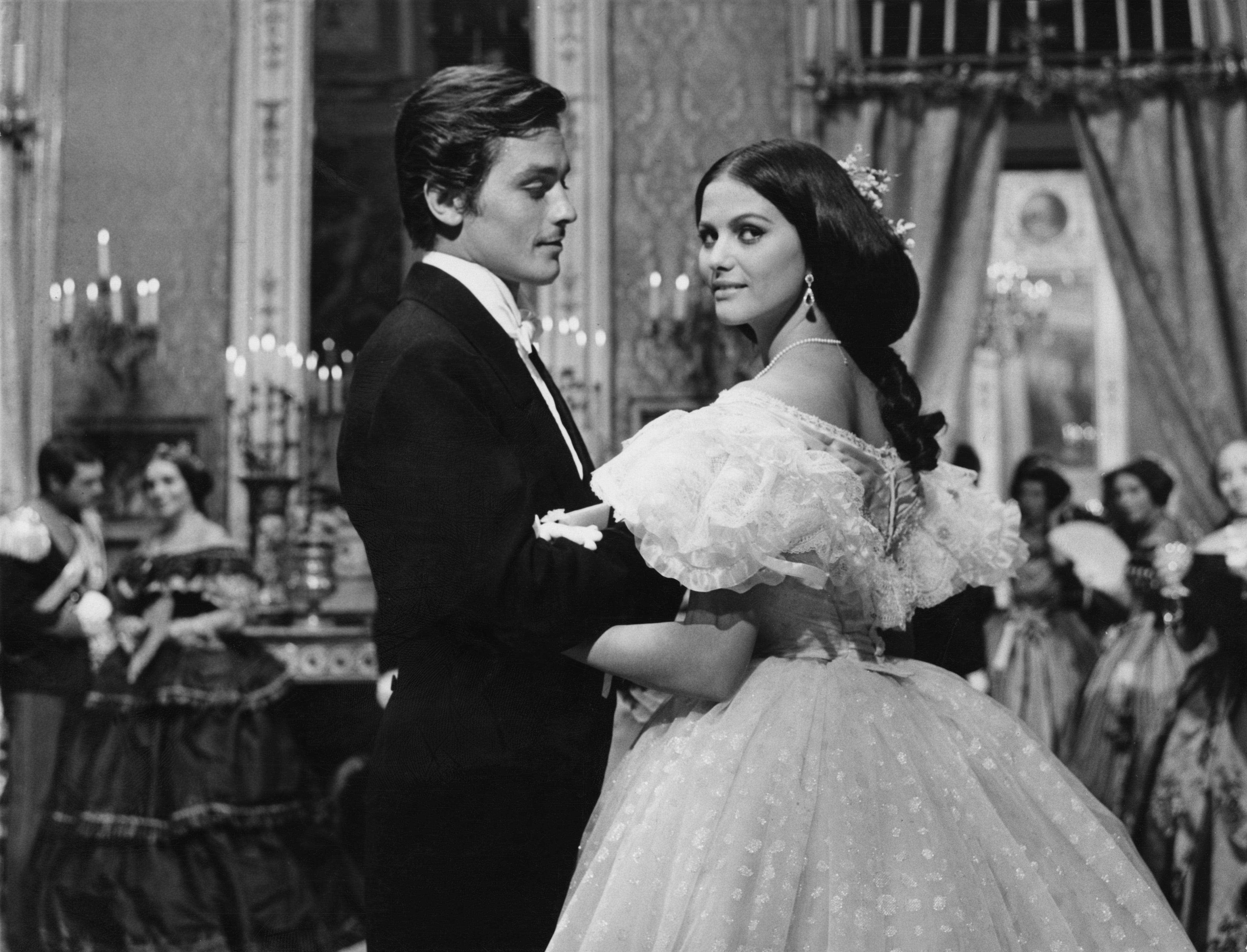 <p style="margin: 0;">Alain Delon with Cardinale in "The Leopard", directed by Luchino Visconti on Sept. 17, 1962, in Rome. </p>