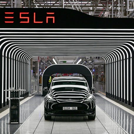 Model Y cars are pictured during the opening ceremony of the Tesla Gigafactory for electric cars in Gruenheide, Germany, March 22, 2022.