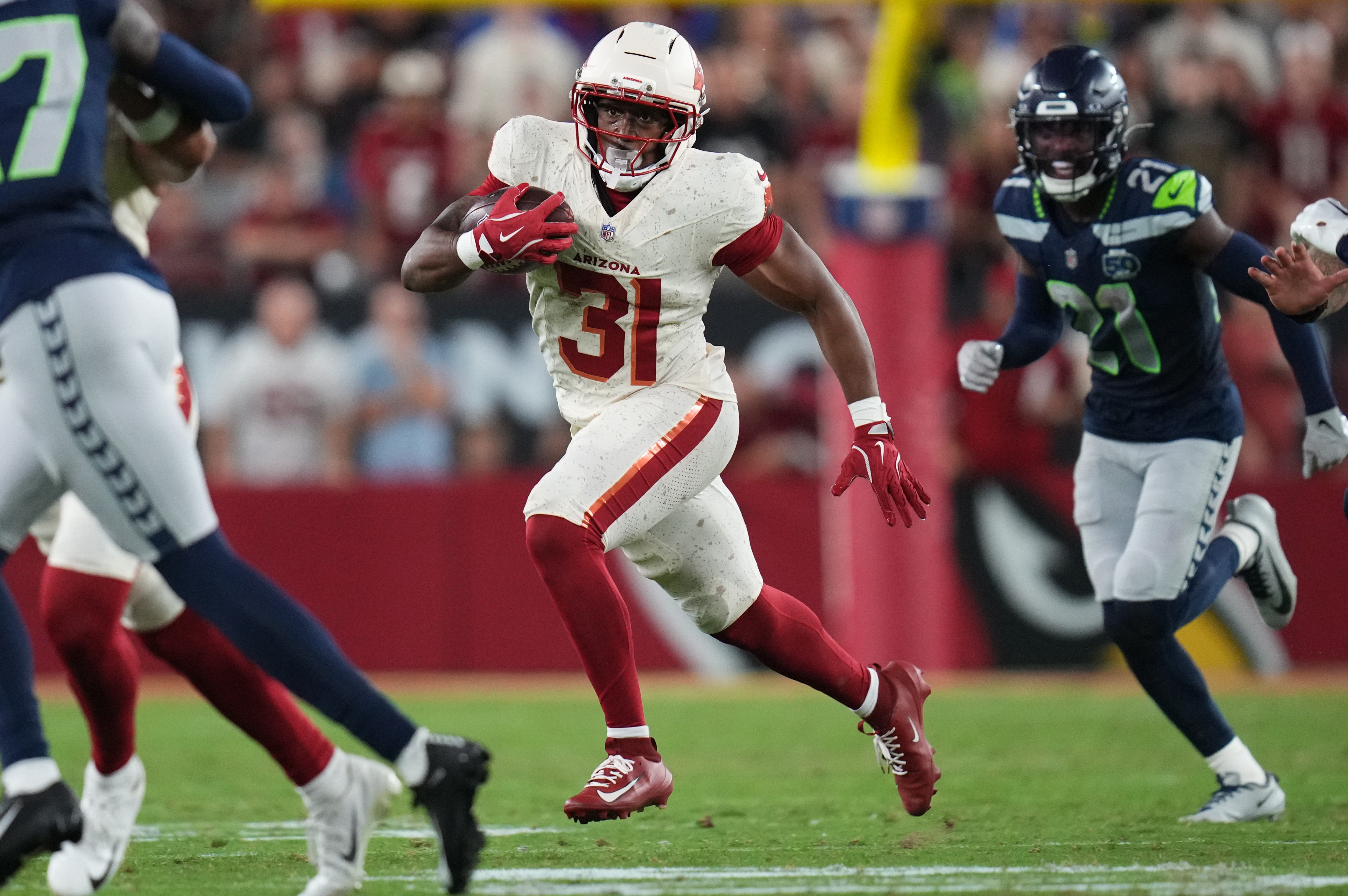 Michael Carter or Emari Demercado? Who could start at running back for Cardinals