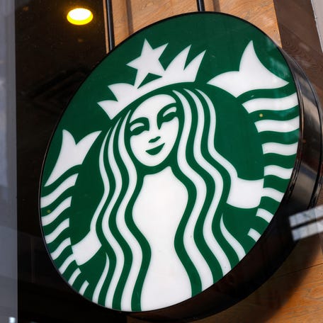 A Starbucks store sign is seen in Manhattan, New York on Feb. 25, 2025.