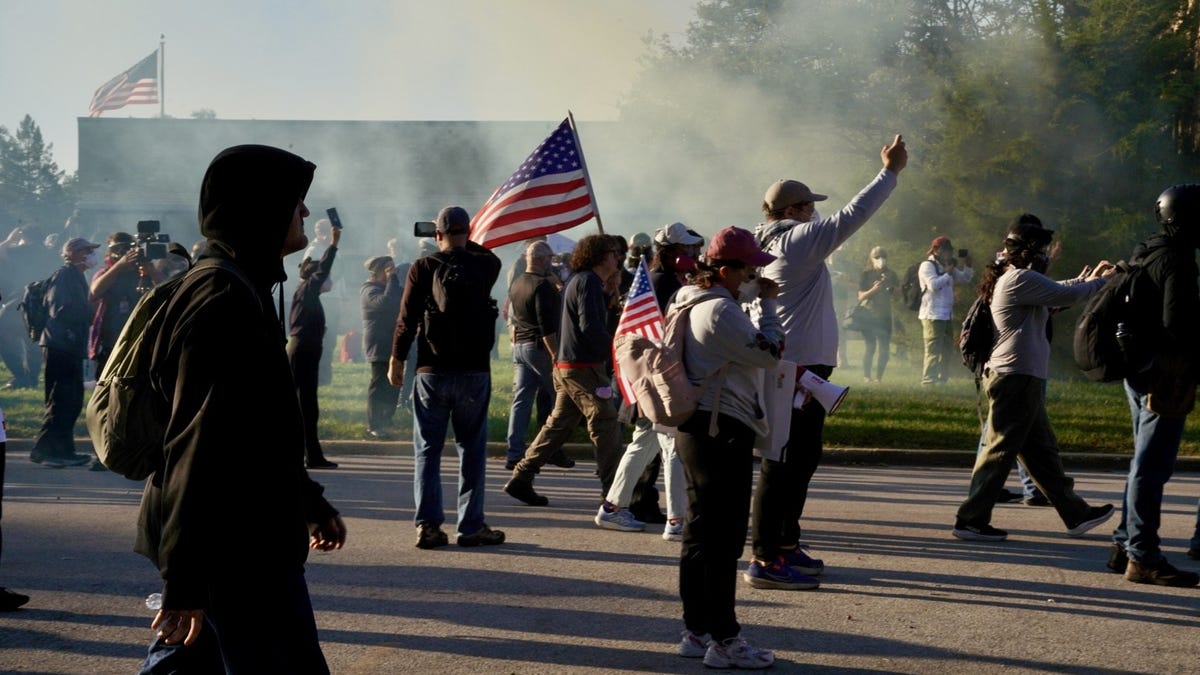 Anti-immigration enforcement protesters rally on Sept. 26 outside a U.S.Immigration and Customs Enforcement facility in Broadview, Illinois.