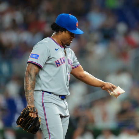 New York Mets relief pitcher Gregory Soto (65) tosses a rosin bag after allowing a two-run home run against Miami Marlins pinch hitter Connor Norby (not pictured) during the fifth inning at loanDepot Park.