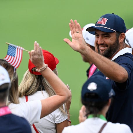 Team USA golfer Scottie Scheffler celebrates on the penultimate day of Ryder Cup competition.