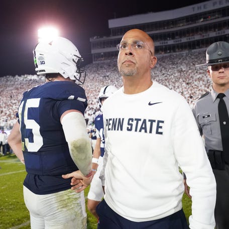 Penn State Nittany Lions head coach James Franklin and quarterback Drew Allar (15) react after losing to the Oregon Ducks at Beaver Stadium.