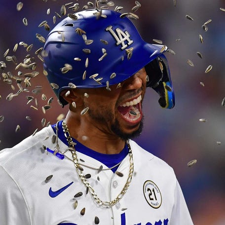 Mookie Betts and the Dodgers face the Cincinnati Reds in the NL wild card series.