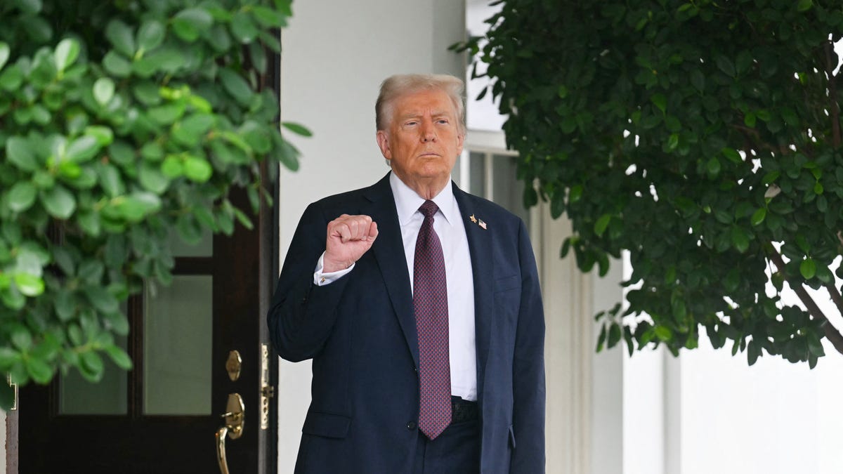 US President Donald Trump gestures as he waits for the arrival of Israeli Prime Minister Benjamin Netanyahu at the West Wing of the White House in Washington, DC on September 29, 2025. US President Donald Trump will push Israeli Prime Minister Benjamin Netanyahu to agree to an elusive Gaza peace plan on Monday in high-stakes talks at the White House.