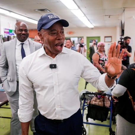 New York City Mayor Eric Adams campaigns for reelection on Sept. 12, 2025, two weeks before dropping out of the race.
