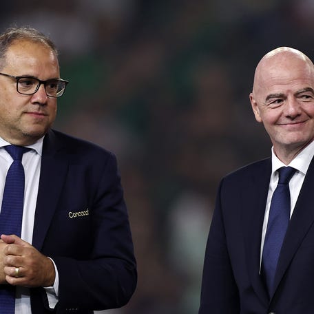 HOUSTON, TEXAS - JULY 06: CONCACAF President Victor Montagliani (L) and FIFA President Gianni Infantino look on during the trophy ceremony after Mexico beat the United States 2-1 to win the CONCACAF Gold Cup 2025 between the United States and Mexico at NRG Stadium on July 06, 2025 in Houston, Texas. (Photo by Omar Vega/Getty Images)