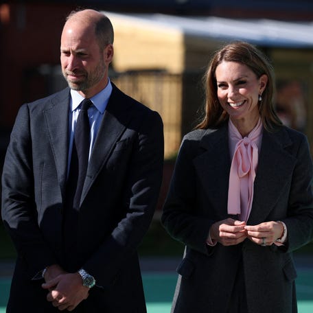 Prince William and Princess Kate visit a commemorative playground at Churchtown Primary School on Sept. 23, 2025, in Southport, England.