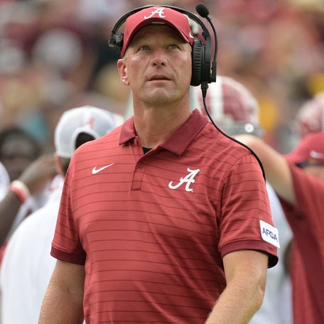 Alabama coach Kalen DeBoer watches his team's game against Florida State during the second half at Doak S. Campbell Stadium.