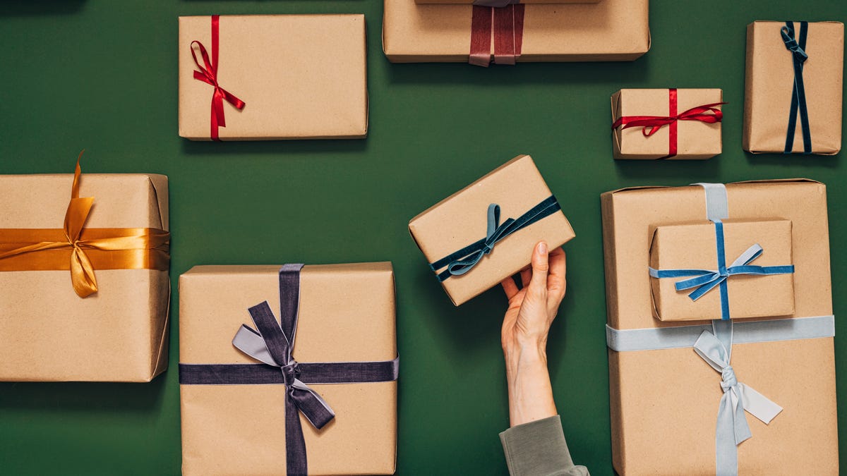 Nicely wrapped gifts with different colored ribbons.