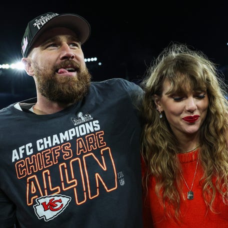 BALTIMORE, MARYLAND - JANUARY 28: Travis Kelce #87 of the Kansas City Chiefs (L) celebrates with Taylor Swift after defeating the Baltimore Ravens in the AFC Championship Game at M&T Bank Stadium on January 28, 2024 in Baltimore, Maryland. (Photo by Patrick Smith/Getty Images)