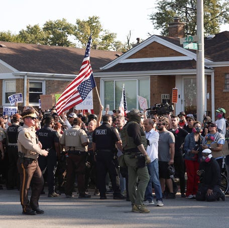 People protest outside the U.S. Immigration and Customs Enforcement (ICE) facility in the Chicago suburb of Broadview, Illinois, on Oct. 3, 2025.