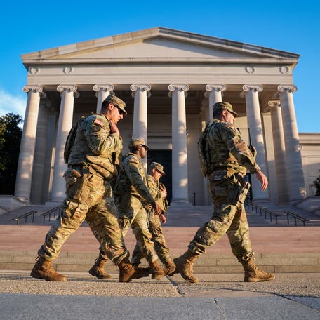 Oct 1, 2025; Washington, DC, USA; National Guard patrol near the National Gallery of Art on the morning of the first day of the federal government shutdown on October 1, 2025, after President Donald Trump and congressional leaders failed to reach a funding compromise.