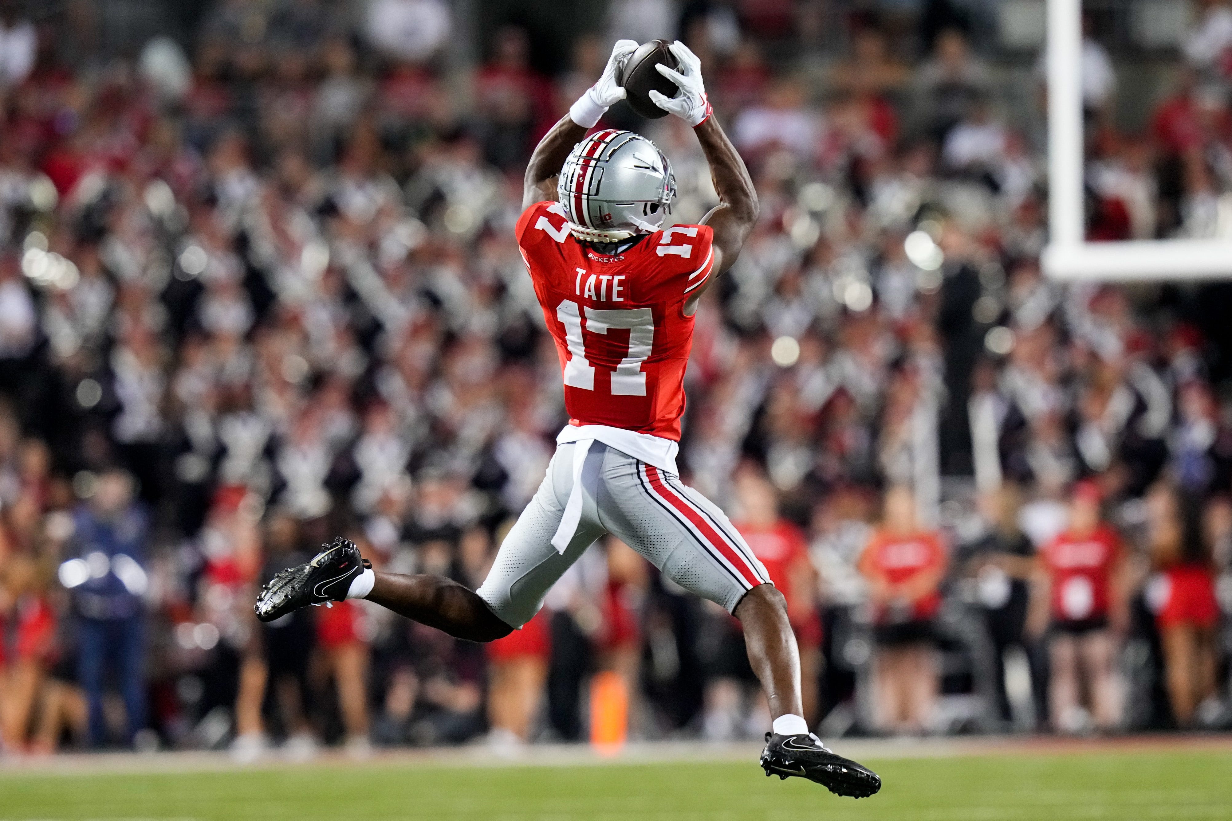 Ohio State Buckeyes wide receiver Carnell Tate (17) catches a pass against the Minnesota Golden Gophers in the first half of the NCAA football game at Ohio Stadium on Saturday, Oct. 4, 2025 in Columbus, Ohio.
