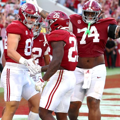Alabama running back Jam Miller (26) celebrates his touchdown with teammates during the second half against Vanderbilt at Saban Field at Bryant-Denny Stadium.