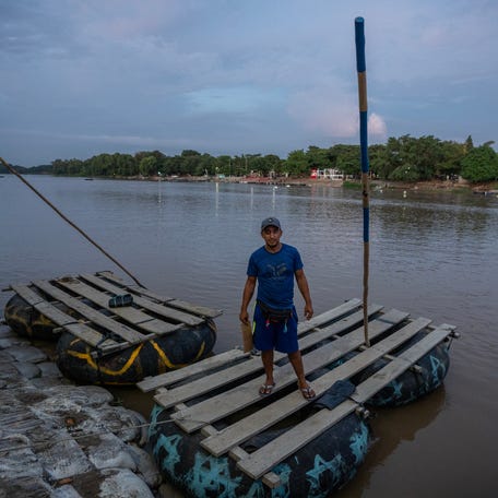 Alexis Vargas, a raft pilot from Guatemala, waits for customers on the Mexican side of the Suchiate River, along the border with Guatemala, on Thursday, August 21, 2025. A year earlier, Vargas was earning up to $100 a day ferrying migrants from Guatemala to Mexico on their journey to the United States.