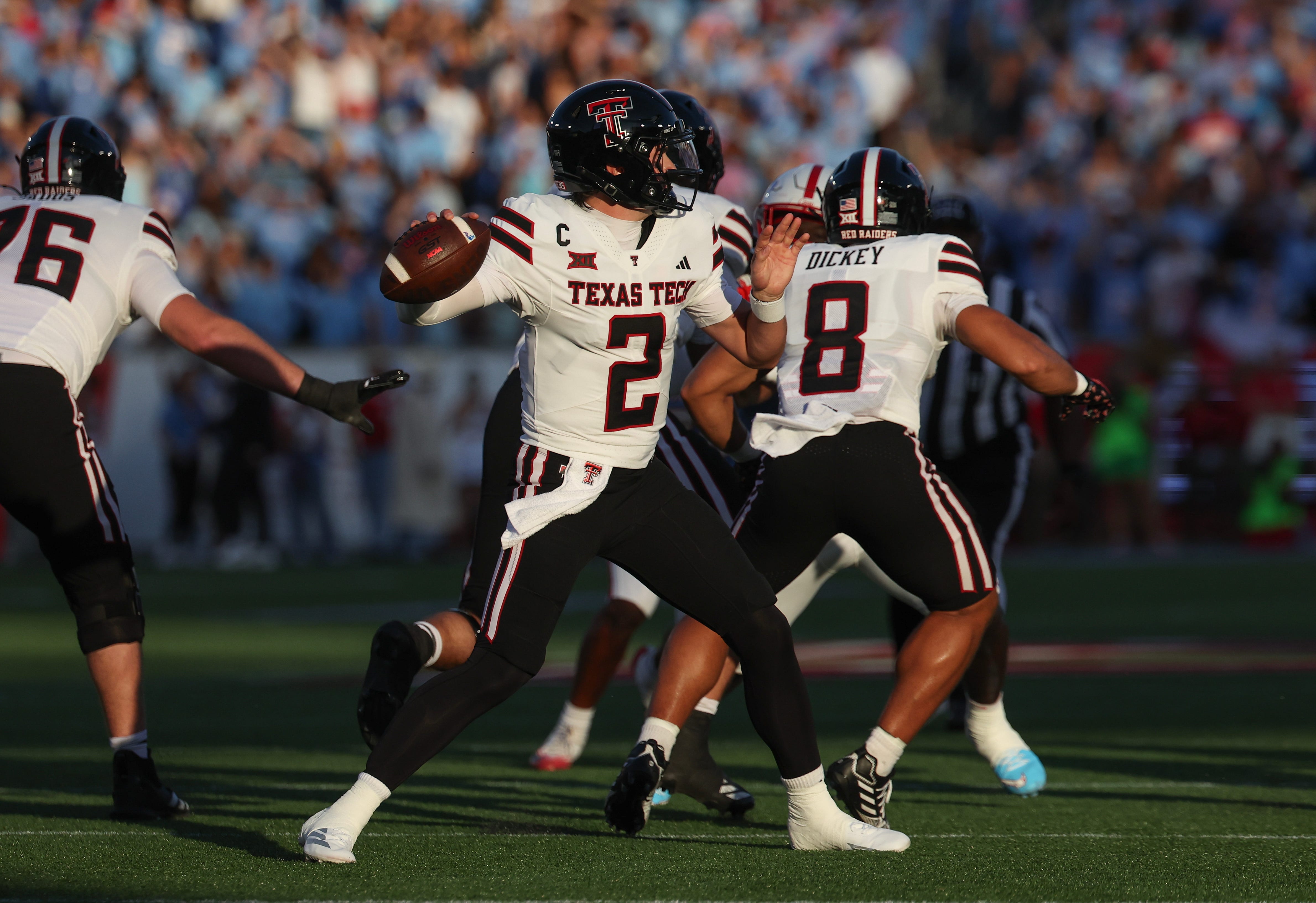Oct 4, 2025; Houston, Texas, USA; Texas Tech Red Raiders quarterback Behren Morton (2) drops back to pass against the Houston Cougars in the first half at TDECU Stadium. Mandatory Credit: Thomas Shea-Imagn Images