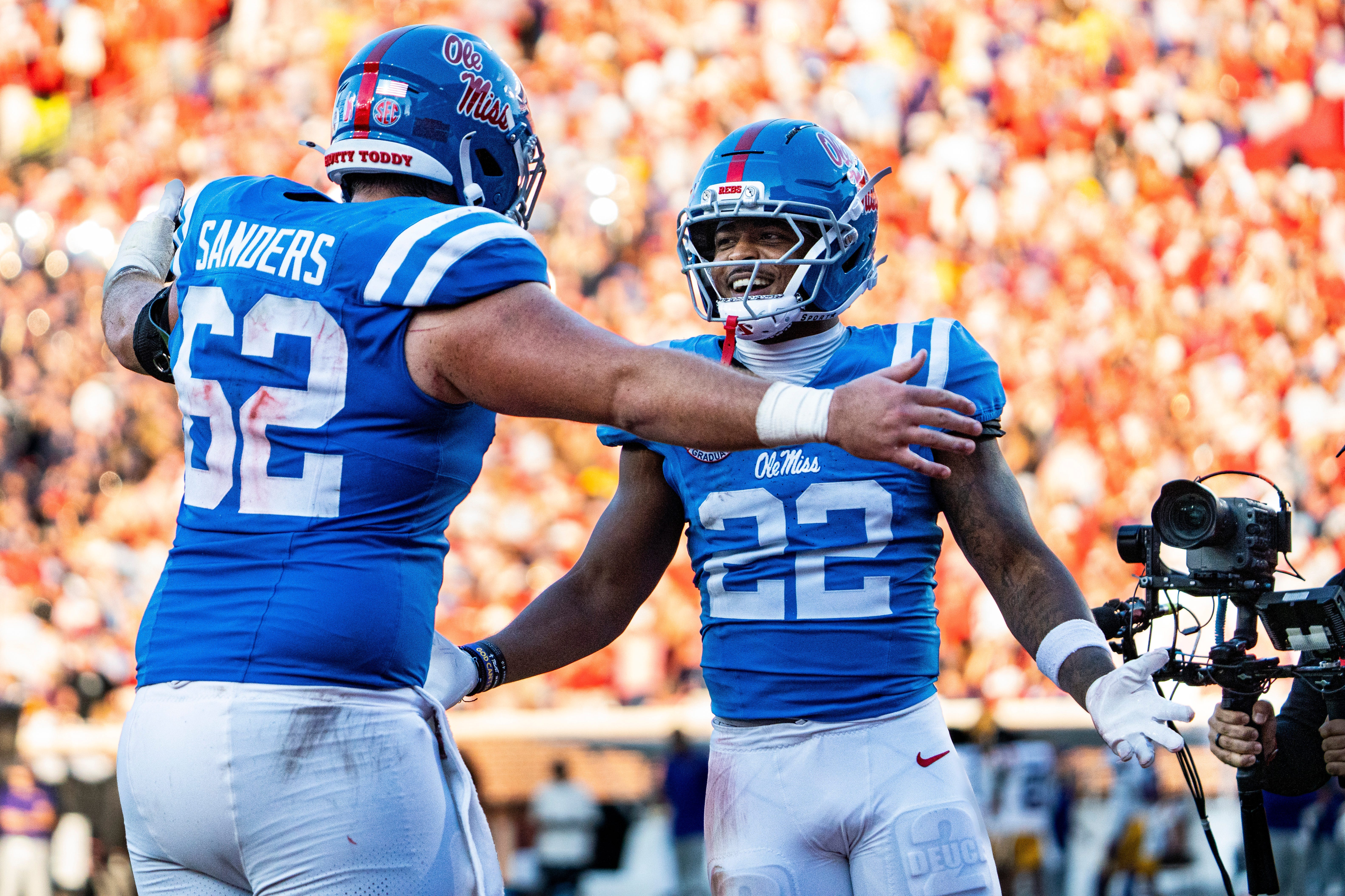 Ole Miss running back Logan Diggs (22) celebrates with offensive lineman Brycen Sanders (62) during a college football game between Ole Miss and LSU at Vaught-Hemingway Stadium in Oxford, Miss., on Saturday, Sept. 27, 2025. Ole Miss defeated LSU 24-19.