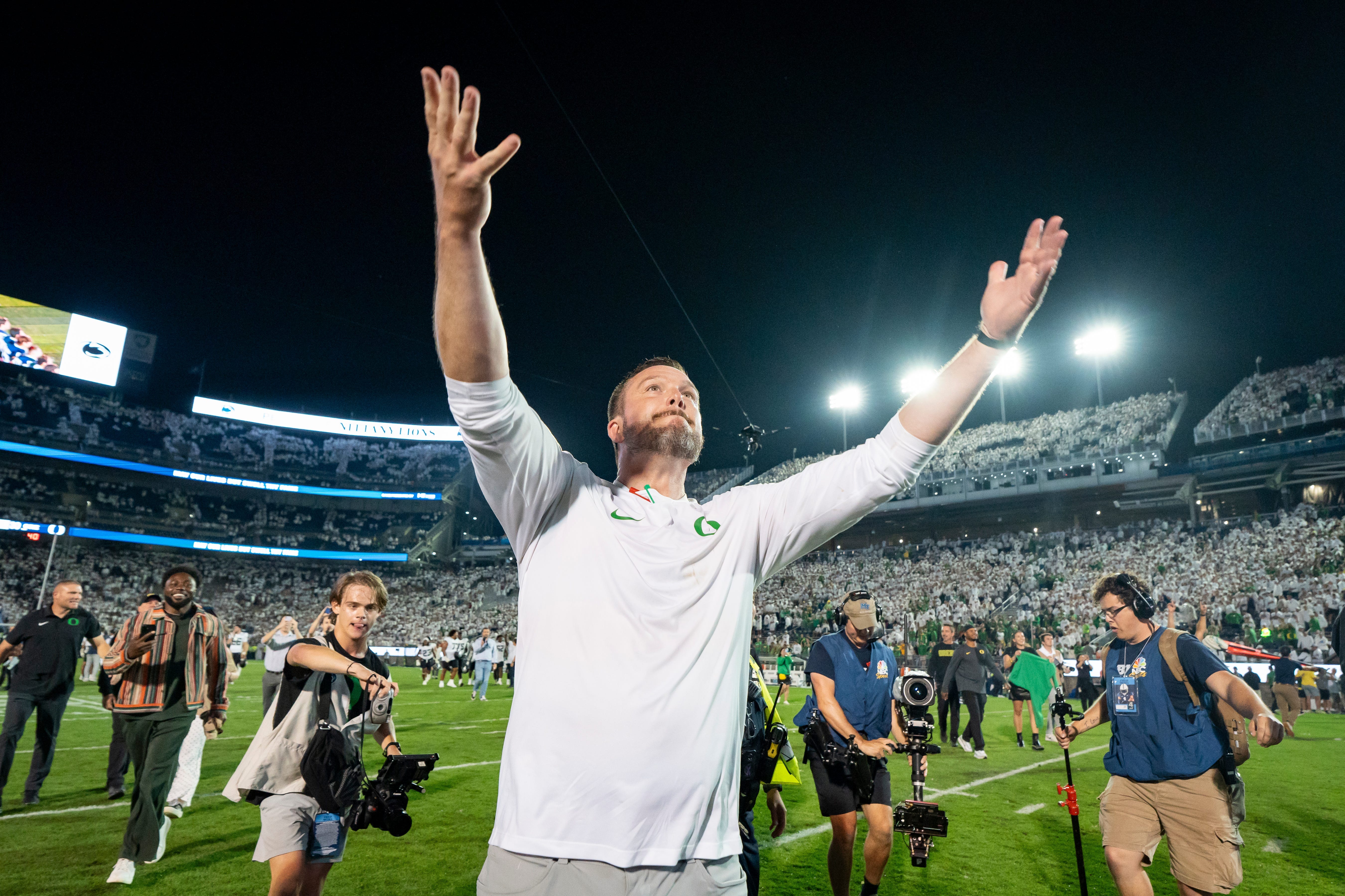 Oregon head coach Dan Lanning celebrates the Ducksâ€™ win as the Oregon Ducks face the Penn State Nittany Lions on Sept. 27, 2025, at Beaver Stadium in University Park, Pennsylvania.