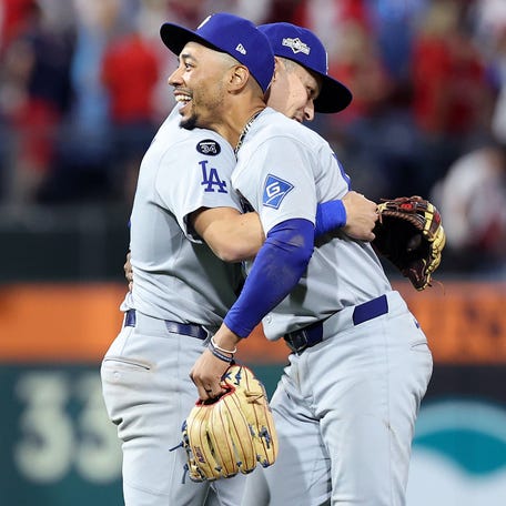 Mookie Betts celebrates with Tommy Edman after the Game 2 win.