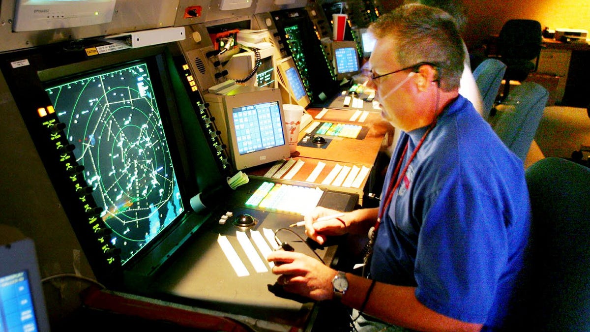 Air traffic controller Derick Hines is using the new Standard Terminal Automation Replacement System (STARS) at the Nashville International Airport on July 21, 2005. The upgrade system improvements could boots safety and reduce travel delays.
