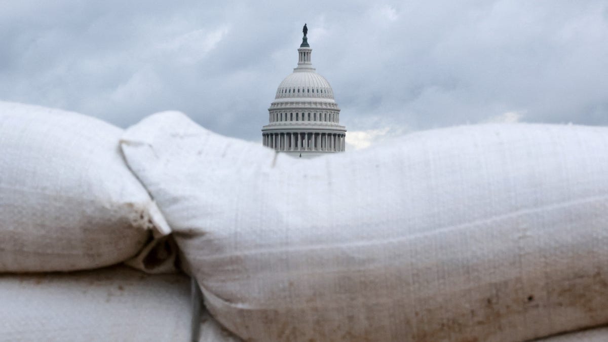 The U.S. Capitol behind construction sandbags in Washington, D.C., on Oct. 8, 2025, the eighth day of the federal government shutdown.