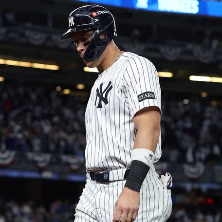 Aaron Judge walks off the field after the final out of the ALDS.