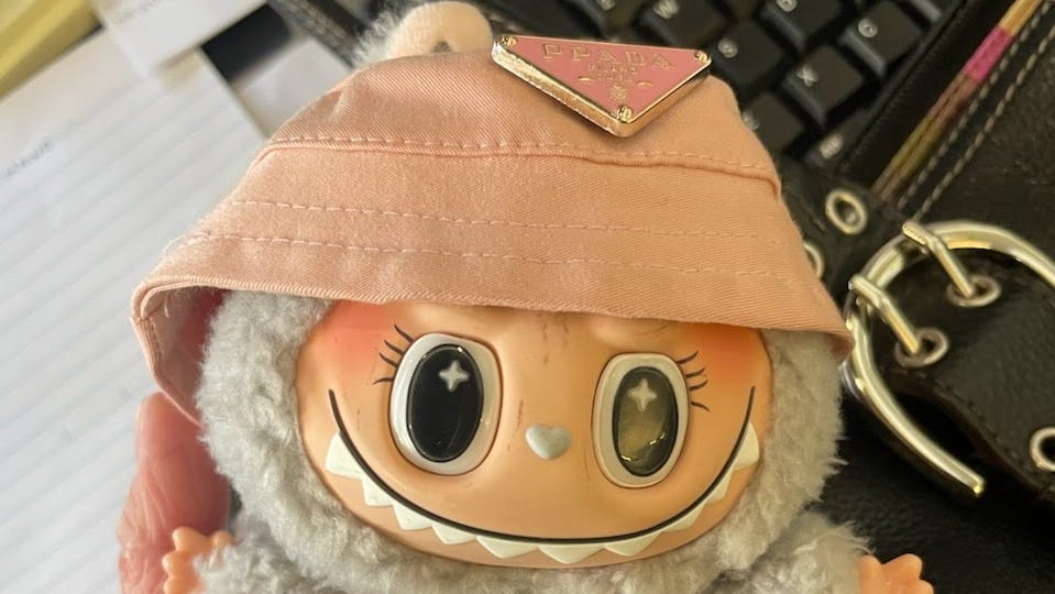 Emily Huang bought a dupe of the popular Labubu doll, called a Lafufu.