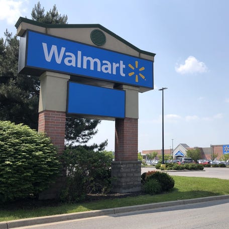 The community gathers June 13 to help celebrate the new-look Walmart store in Macedon, New York.