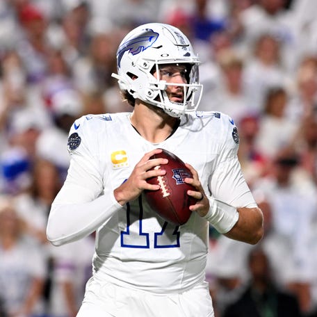 Oct 5, 2025; Orchard Park, New York, USA; Buffalo Bills quarterback Josh Allen (17) drops back to pass against the New England Patriots during the first half at Highmark Stadium.