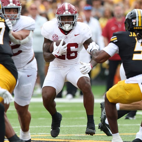 Alabama running back Jamarion Miller (26) runs the ball against Missouri during the first half at Faurot Field at Memorial Stadium.