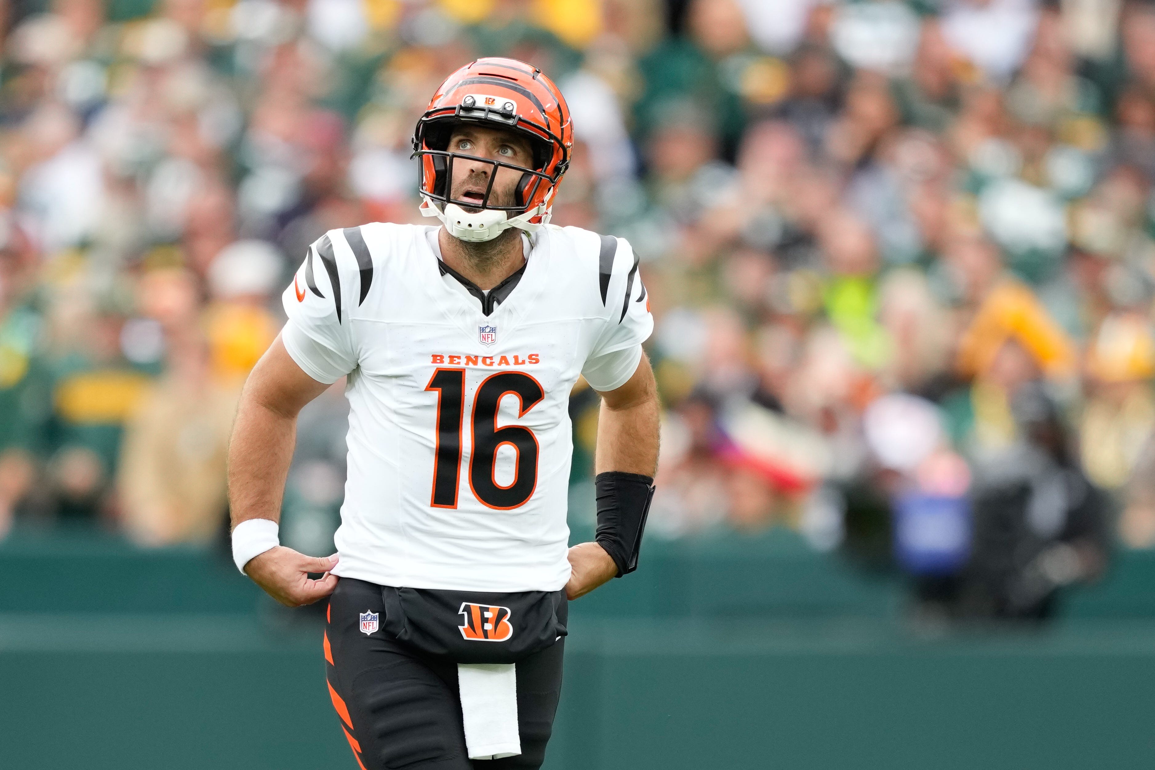 Oct 12, 2025; Green Bay, Wisconsin, USA; Cincinnati Bengals quarterback Joe Flacco (16) looks on in between plays in the second quarter against the Green Bay Packers at Lambeau Field. Mandatory Credit: Jeff Hanisch-Imagn Images