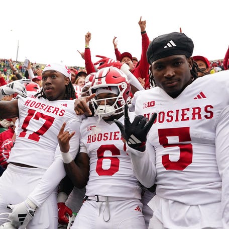Indiana players and fans celebrate after the team's 30-20 defeat of Oregon at Autzen Stadium.