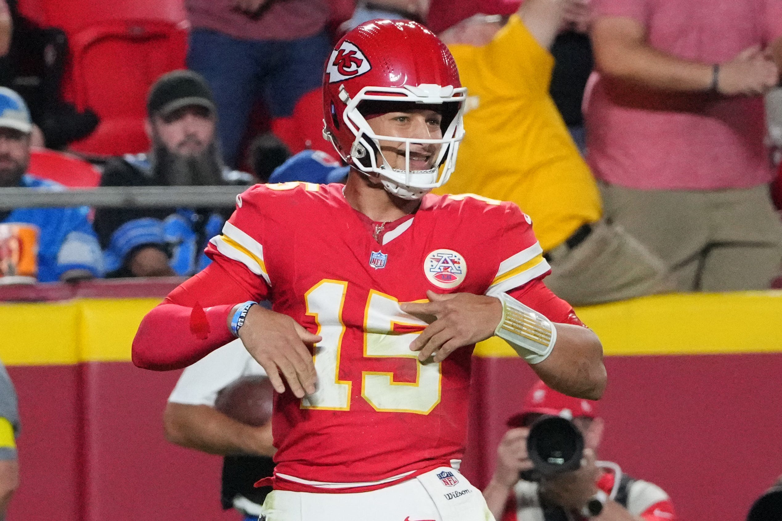 Oct 12, 2025; Kansas City, Missouri, USA; Kansas City Chiefs quarterback Patrick Mahomes (15) reacts after a touchdown against the Detroit Lions during the first half at GEHA Field at Arrowhead Stadium. Mandatory Credit: Denny Medley-Imagn Images