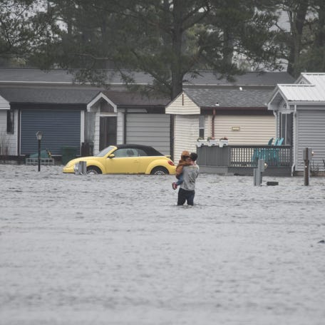 Flooded houses are seen in Mariner's Cove in Long Neck during a nor'easter Oct. 12, 2025.